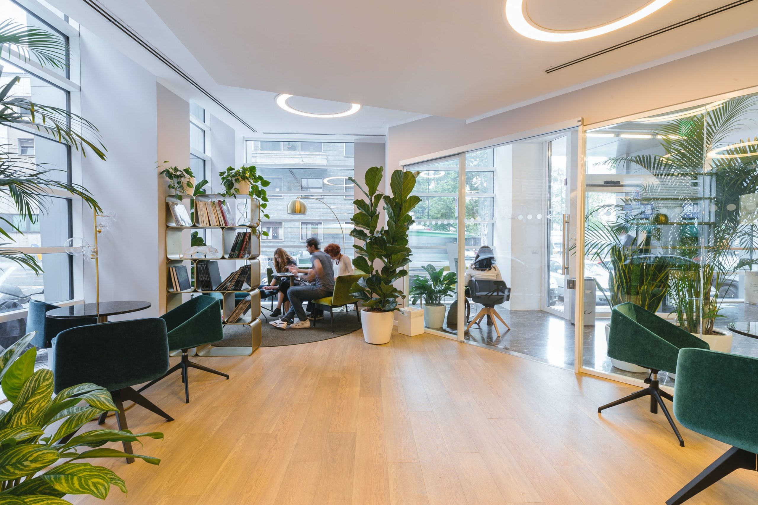 Open plan office with LED lighting. LED by vision are light specialists with a mission to help businesses achieve carbon and cost-neutral goals via their lighting solutions.